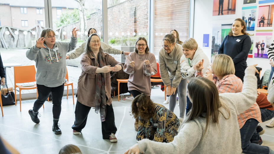 A group of teachers and artists explore freeze frames during a professional learning day at the Point.